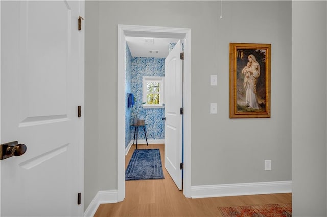 hallway featuring light hardwood / wood-style floors