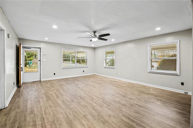 spare room featuring ceiling fan and wood-type flooring