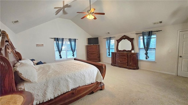 bedroom with lofted ceiling, ceiling fan, and carpet