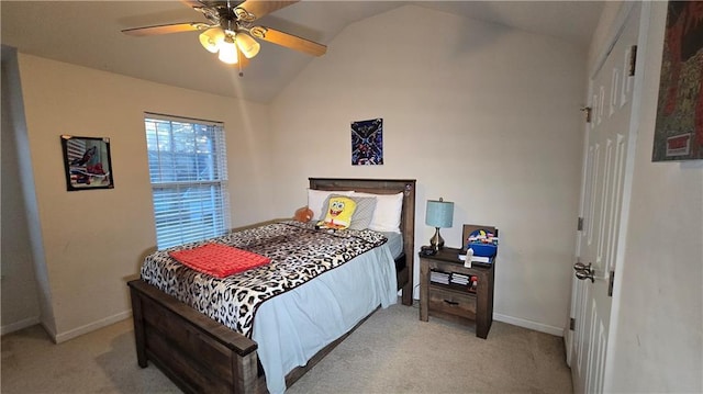 bedroom with lofted ceiling, light colored carpet, and ceiling fan