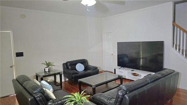 living room featuring crown molding, ceiling fan, and hardwood / wood-style floors