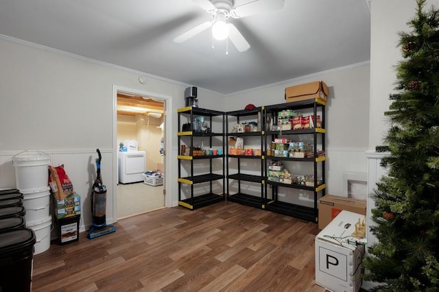storage room featuring ceiling fan and washer / clothes dryer
