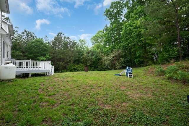 view of yard featuring a deck