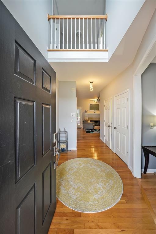 4321 Clairesbrook Ln, Acworth, GA 30101 - entryway featuring a high ceiling, light wood-type flooring, and baseboards