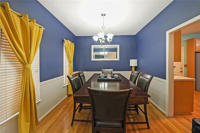4321 Clairesbrook Ln, Acworth, GA 30101 - dining space featuring a chandelier, light wood-style flooring, and baseboards