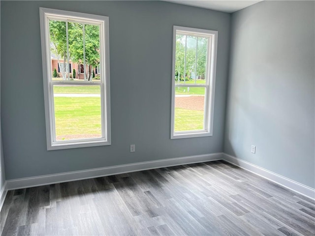154 Pope Paul Path, Dallas, GA 30132 - spare room featuring baseboards and wood finished floors