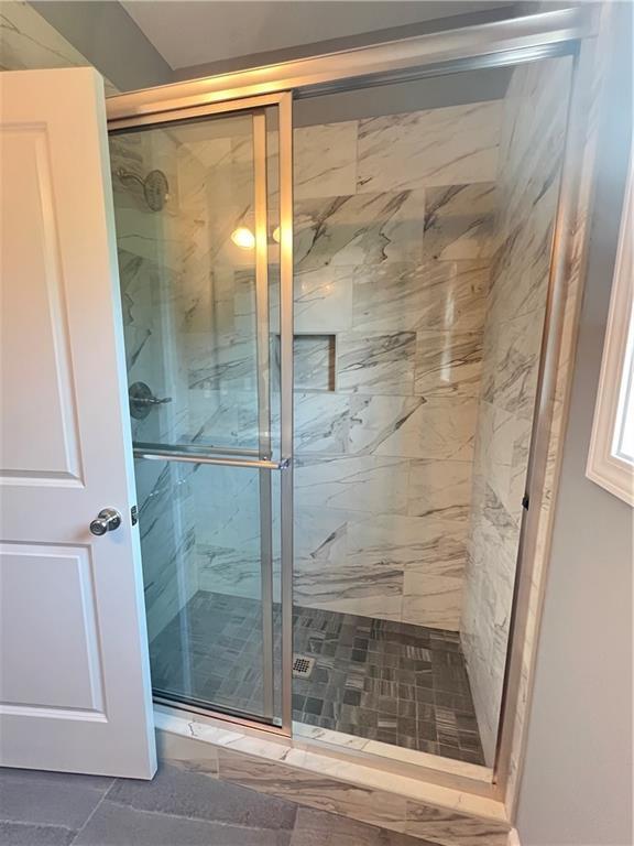 154 Pope Paul Path, Dallas, GA 30132 - bathroom featuring a marble finish shower