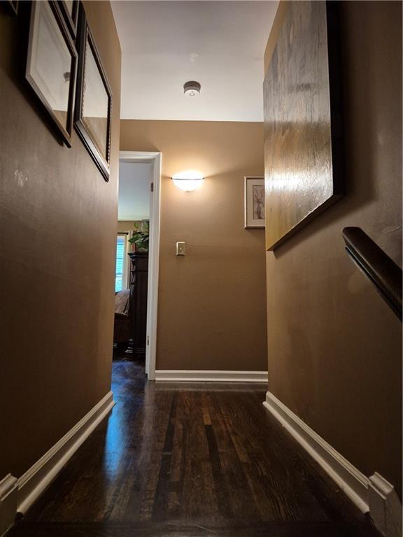 4094 Carlisle Pl, Stone Mountain, GA 30083 - hallway featuring wood finished floors and baseboards