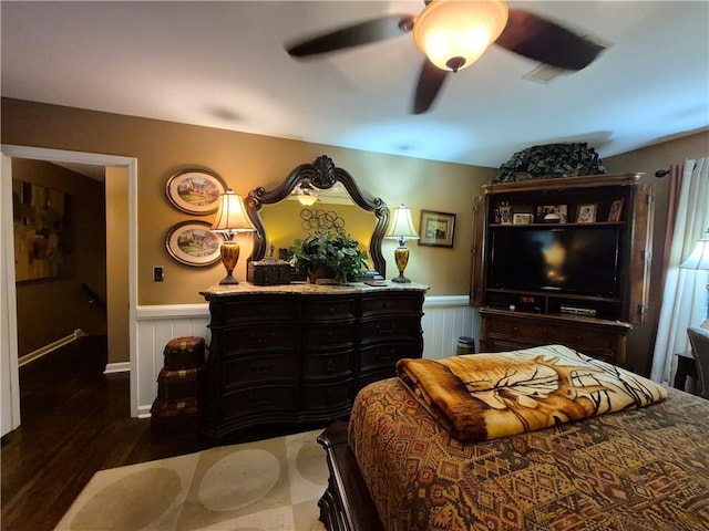 4094 Carlisle Pl, Stone Mountain, GA 30083 - bedroom featuring wainscoting, ceiling fan, and wood finished floors