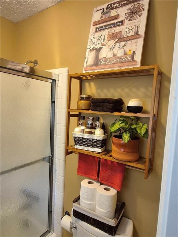 4094 Carlisle Pl, Stone Mountain, GA 30083 - full bathroom featuring a shower with door and a textured ceiling