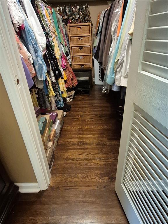 4094 Carlisle Pl, Stone Mountain, GA 30083 - walk in closet featuring wood finished floors