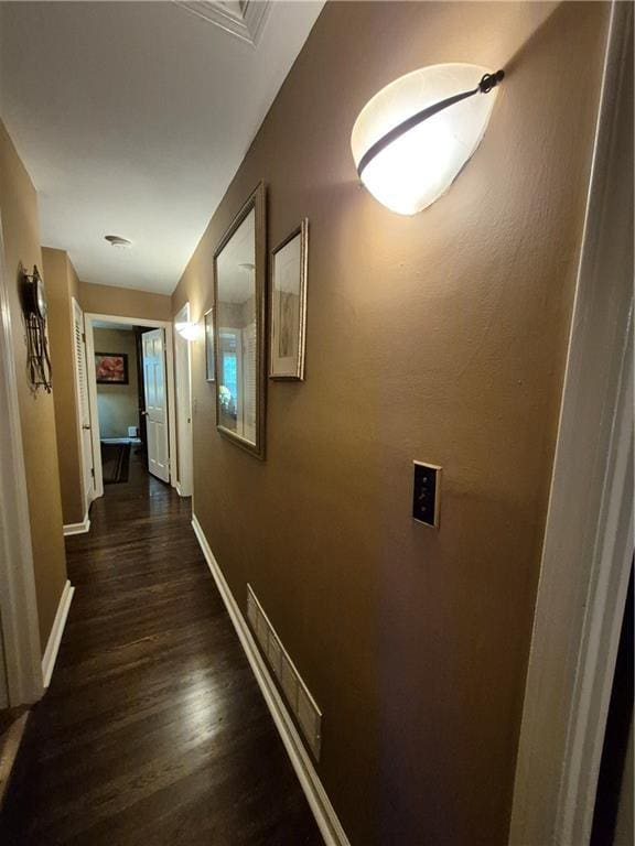 4094 Carlisle Pl, Stone Mountain, GA 30083 - hallway with dark wood finished floors and baseboards