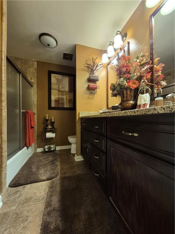 4094 Carlisle Pl, Stone Mountain, GA 30083 - bathroom with vanity and tile patterned floors