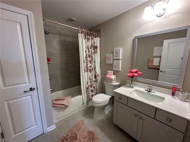 full bath featuring vanity, tile patterned floors, shower / bath combo, and toilet