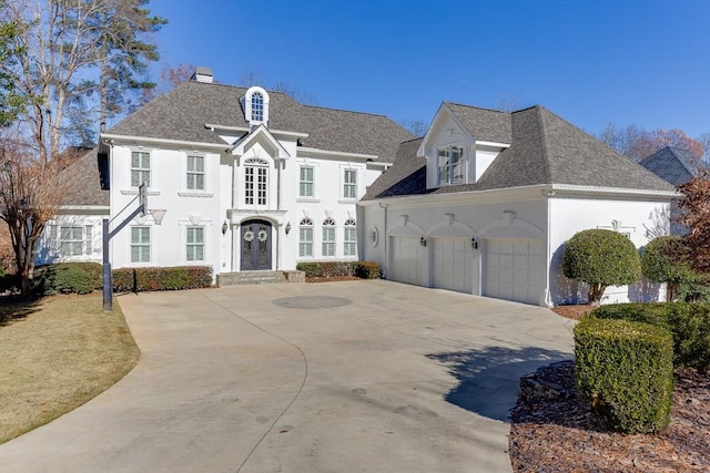 view of front of property with a garage