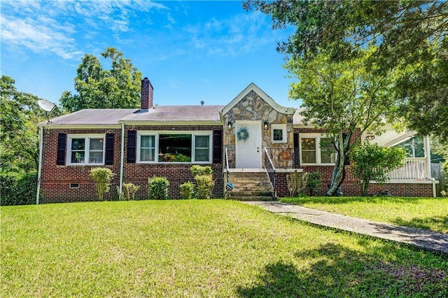 1544 Brewer Blvd SW, Atlanta, GA 30310 - view of front of property featuring a front lawn, a chimney, and brick siding