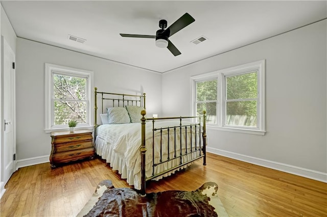 1544 Brewer Blvd SW, Atlanta, GA 30310 - bedroom with baseboards, wood-type flooring, and ceiling fan