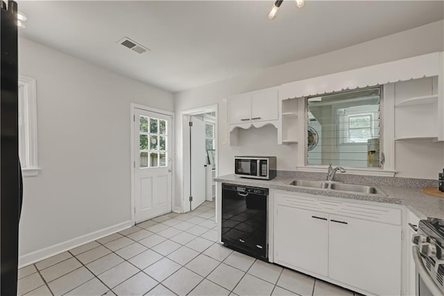 1544 Brewer Blvd SW, Atlanta, GA 30310 - kitchen featuring open shelves, stainless steel appliances, a sink, light countertops, and white cabinets