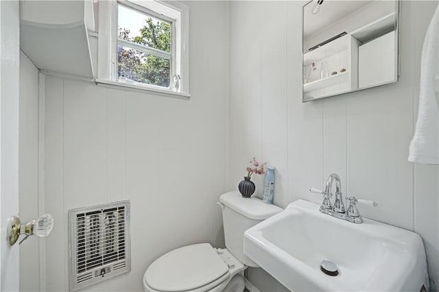 1544 Brewer Blvd SW, Atlanta, GA 30310 - half bath with heating unit, a sink, and toilet