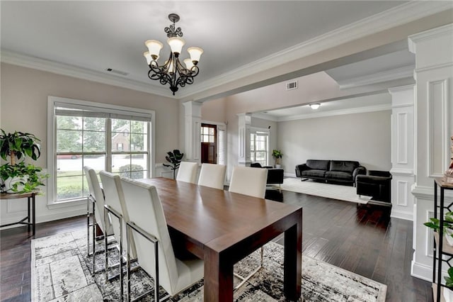 5770 Bridleton Xing, Suwanee, GA 30024 - dining area with decorative columns, dark wood-style flooring, crown molding, and a chandelier