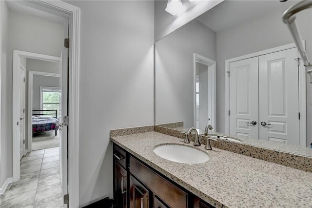 5770 Bridleton Xing, Suwanee, GA 30024 - bathroom featuring vanity and baseboards