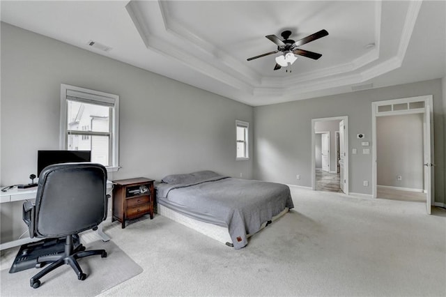 5770 Bridleton Xing, Suwanee, GA 30024 - bedroom featuring a tray ceiling, multiple windows, a desk, and light carpet
