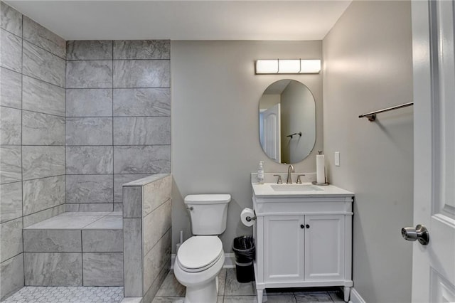 5770 Bridleton Xing, Suwanee, GA 30024 - bathroom featuring vanity, toilet, baseboards, and tiled shower