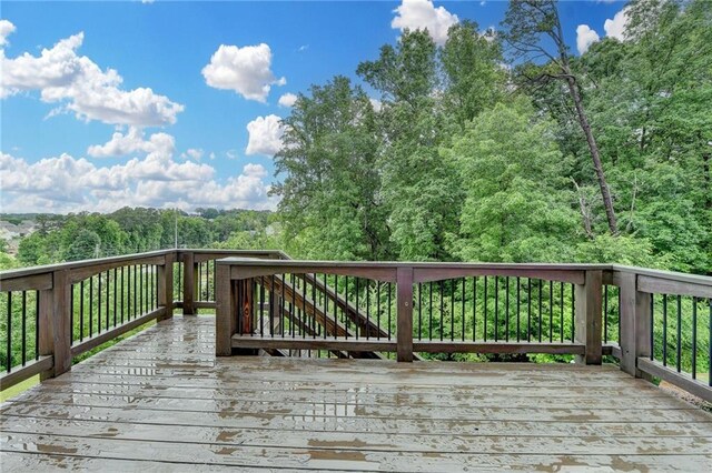 5770 Bridleton Xing, Suwanee, GA 30024 - deck featuring a view of trees