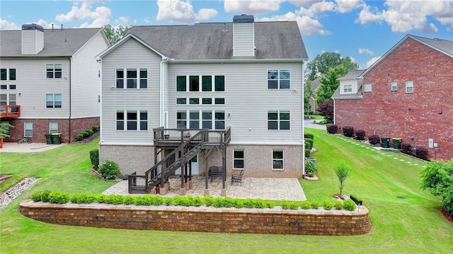 5770 Bridleton Xing, Suwanee, GA 30024 - back of property with a patio area, stairs, a yard, and brick siding