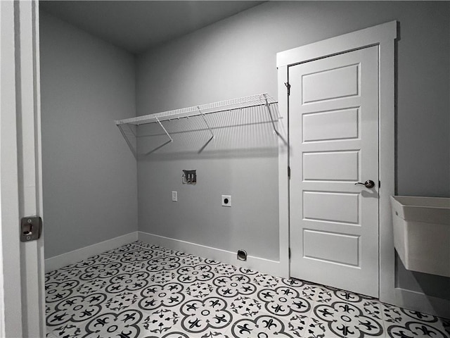 laundry room with washer hookup, light tile patterned flooring, electric dryer hookup, laundry area, and baseboards