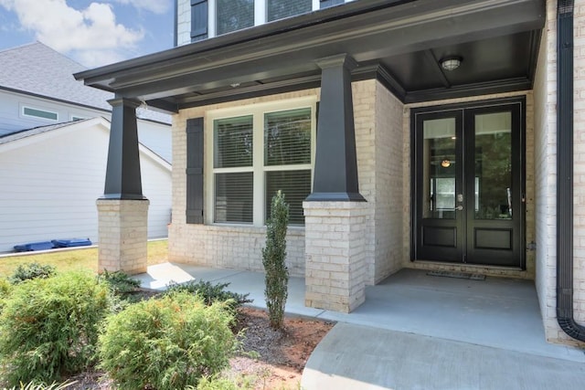 property entrance featuring a porch