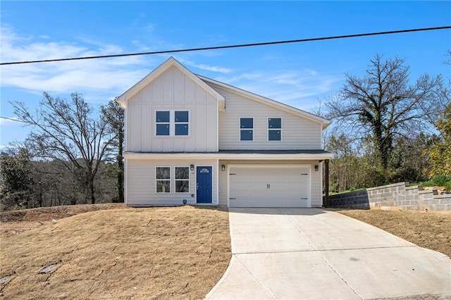 view of front of house with concrete driveway, a garage, and board and batten siding