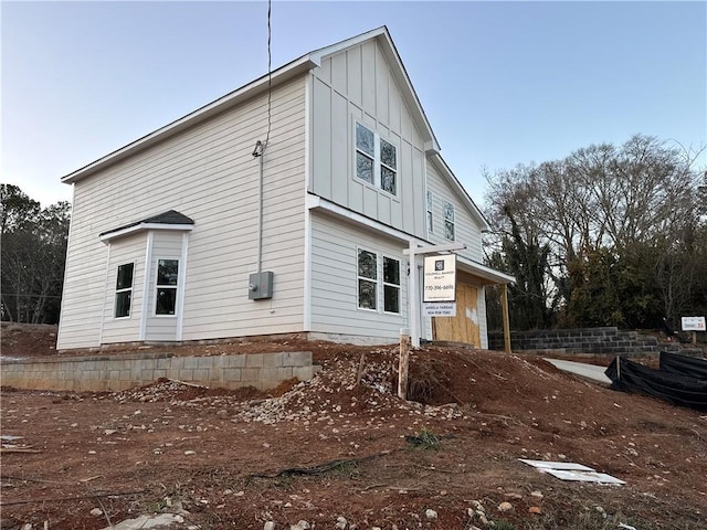 view of side of property featuring board and batten siding