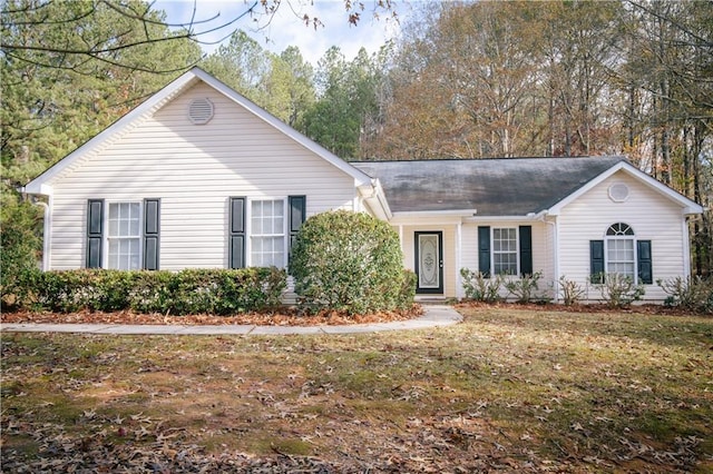 ranch-style house with a front yard