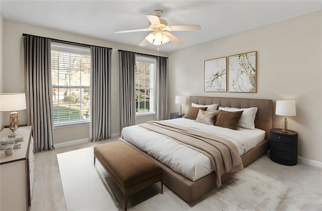 bedroom featuring ceiling fan and baseboards