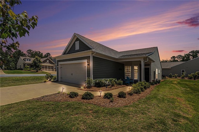 1000 Eight Knot Ct, Greensboro, GA 30642 - view of property exterior featuring a lawn, driveway, an attached garage, and roof with shingles