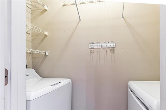 220 Renaissance Pkwy NE Unit 1105, Atlanta, GA 30308 - washroom with washing machine and clothes dryer