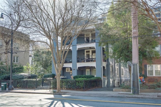 view of property with a fenced front yard