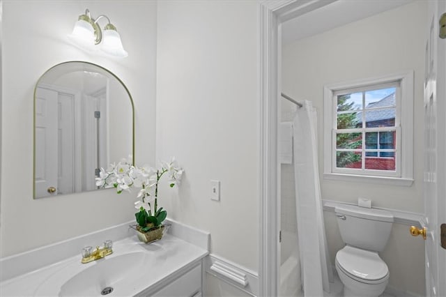 full bathroom featuring shower / washtub combination, toilet, and vanity