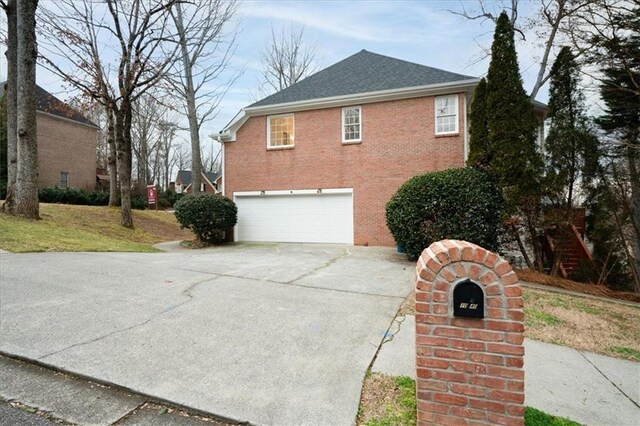 view of home's exterior with a garage