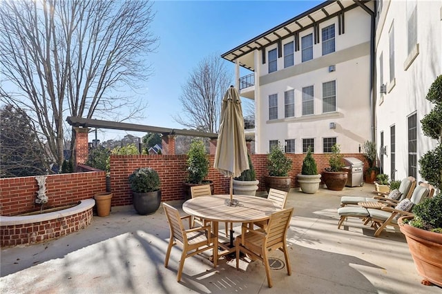 view of patio / terrace with a balcony