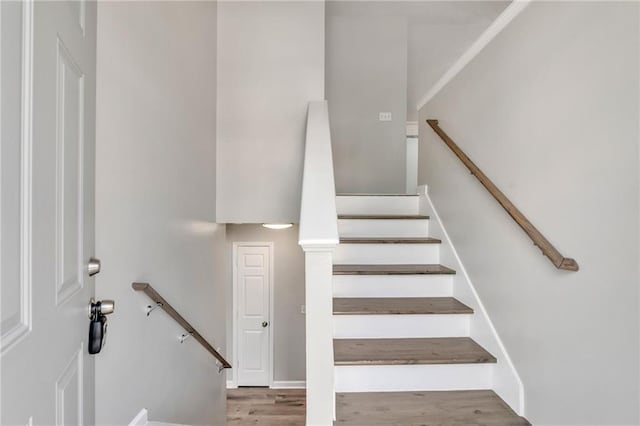 7262 Sandpiper Way, Riverdale, GA 30274 - staircase featuring wood finished floors