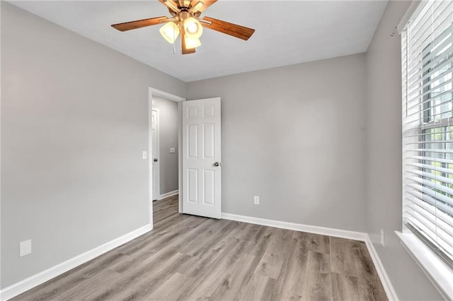 7262 Sandpiper Way, Riverdale, GA 30274 - unfurnished room featuring wood finished floors, ceiling fan, and baseboards