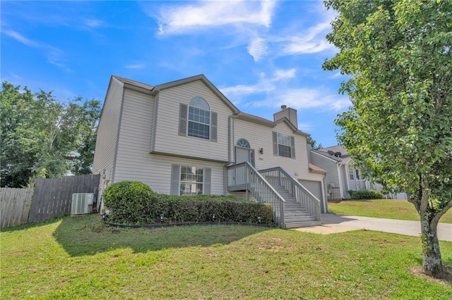 7262 Sandpiper Way, Riverdale, GA 30274 - view of front of property with central air condition unit, driveway, and a chimney