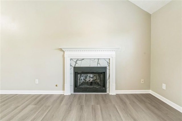 7262 Sandpiper Way, Riverdale, GA 30274 - detailed view of wood finished floors, baseboards, and a fireplace