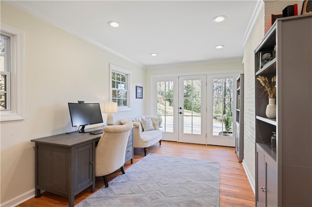 office space featuring french doors, crown molding, recessed lighting, light wood-type flooring, and baseboards