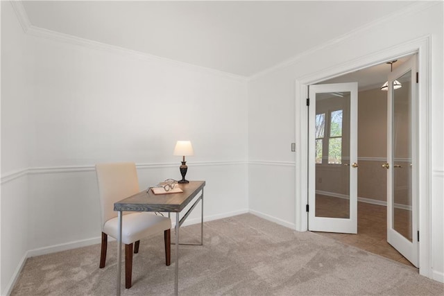 carpeted office with french doors, baseboards, and crown molding