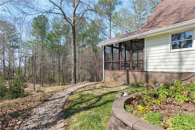 view of yard featuring a sunroom