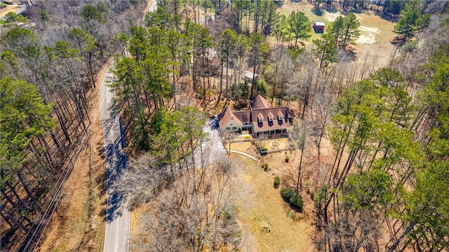 aerial view featuring a forest view