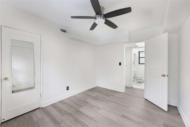 330 3rd St Apt 1, Atlanta, GA 30308 - unfurnished room featuring ceiling fan, baseboards, and light wood-type flooring